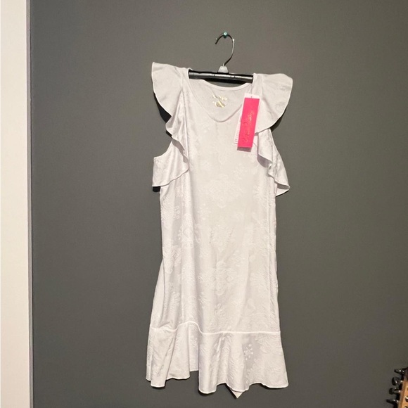lilly pulitzer white ruffle dress Cotton Eyelet Ruffled Hem Resort Vacation Size 2 An exclusive dress from our limited Lilly Pulitzer Tiah Eyelet Midi